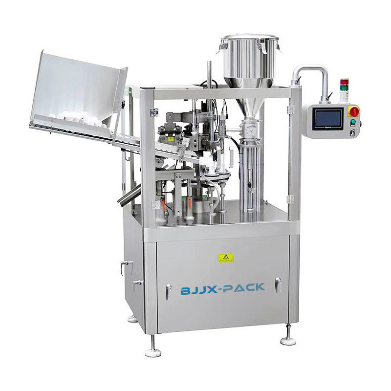 Plastic tube and bottle filling and sealing machine